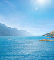Private yacht tour of the Amalfi Coast with dramatic cliffs and crystal-clear waters